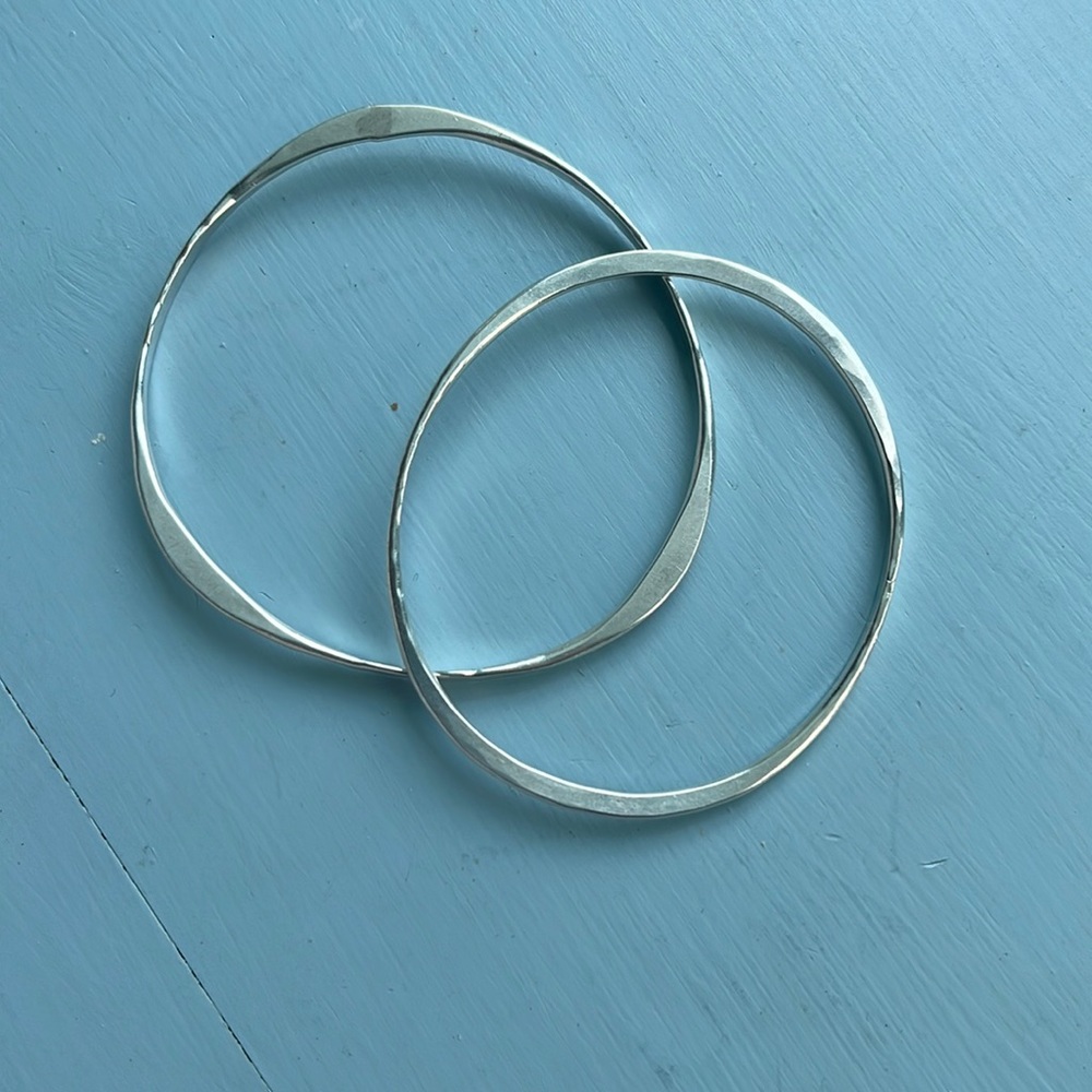 Pair of hammered silver bangle bracelets